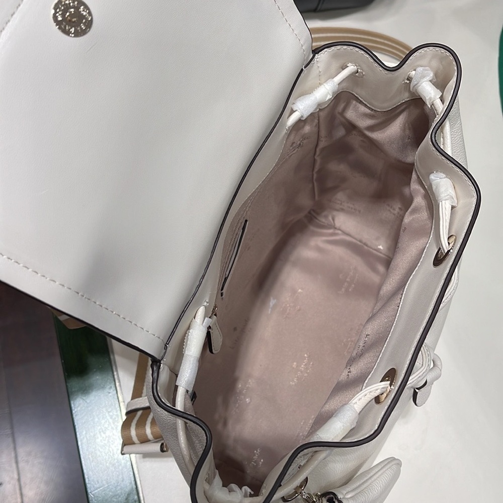 Kate Spade Rosie Medium Flap Backpack 
K8714 pebbled leather Parchment rosie
NWT - Picture 6 of 16